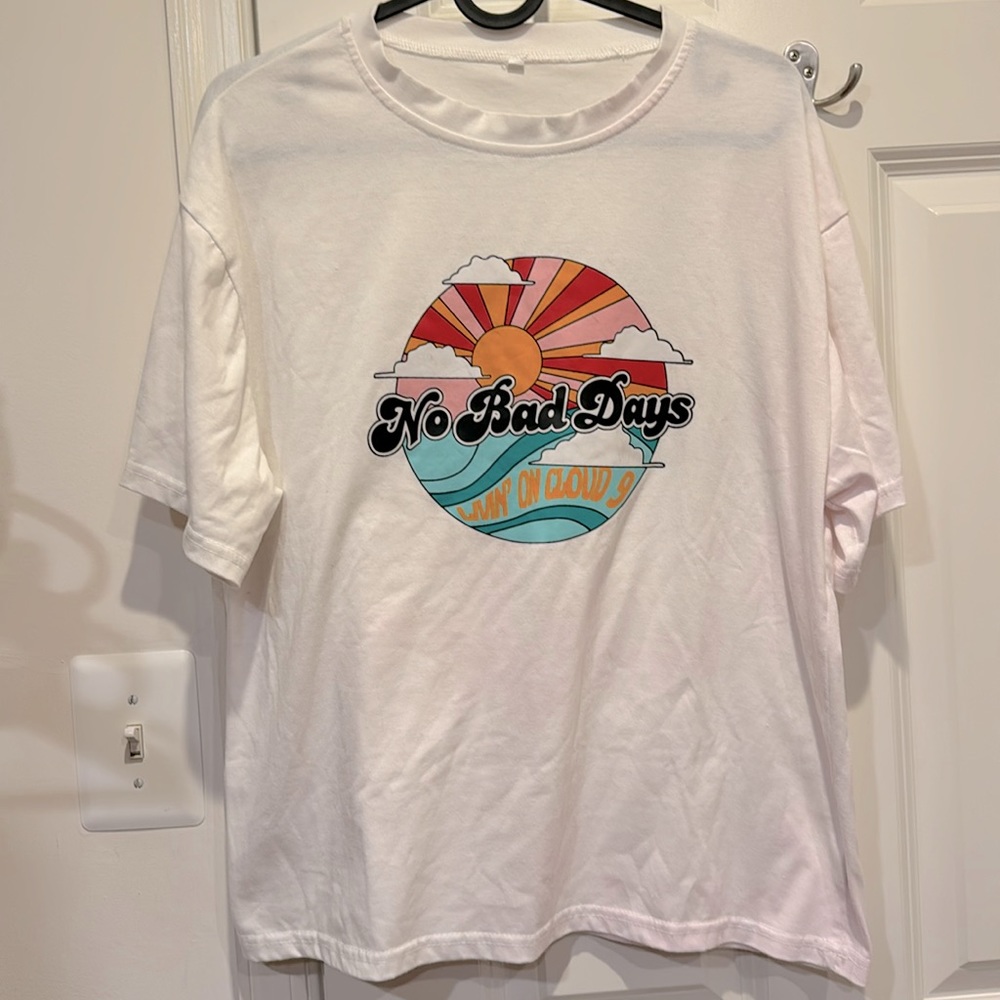 Women’s graphic tee - “No Bad Days”, size XS, white background.